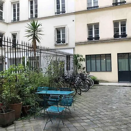 Charming Parisian Under The Rooftops