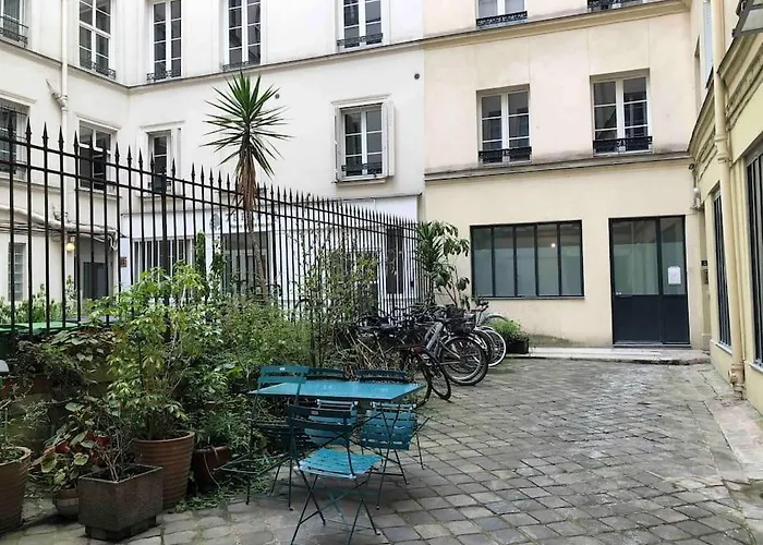 Charming Parisian Under The Rooftops